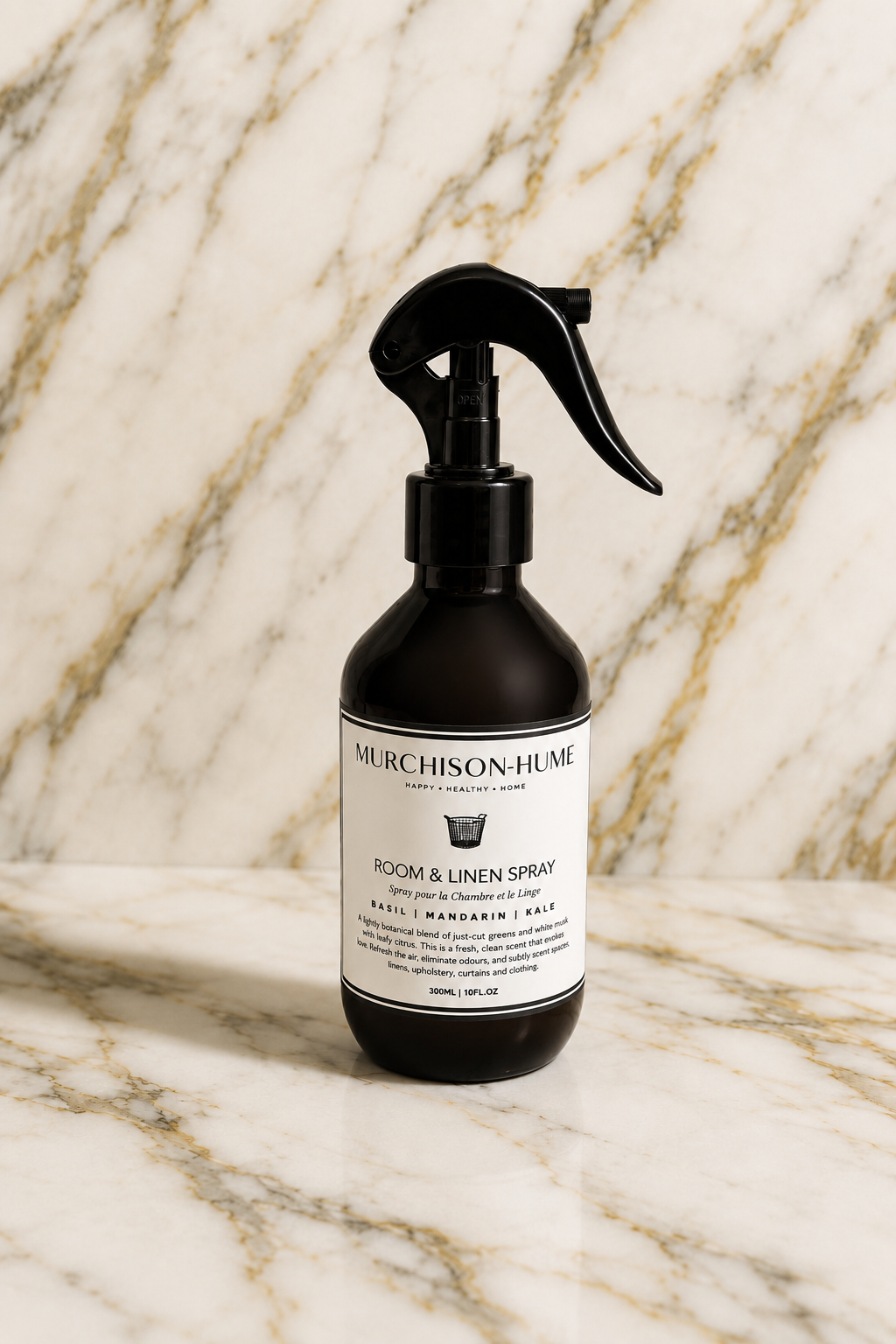 Murchison-Hume room and linen spray bottle on a marble surface