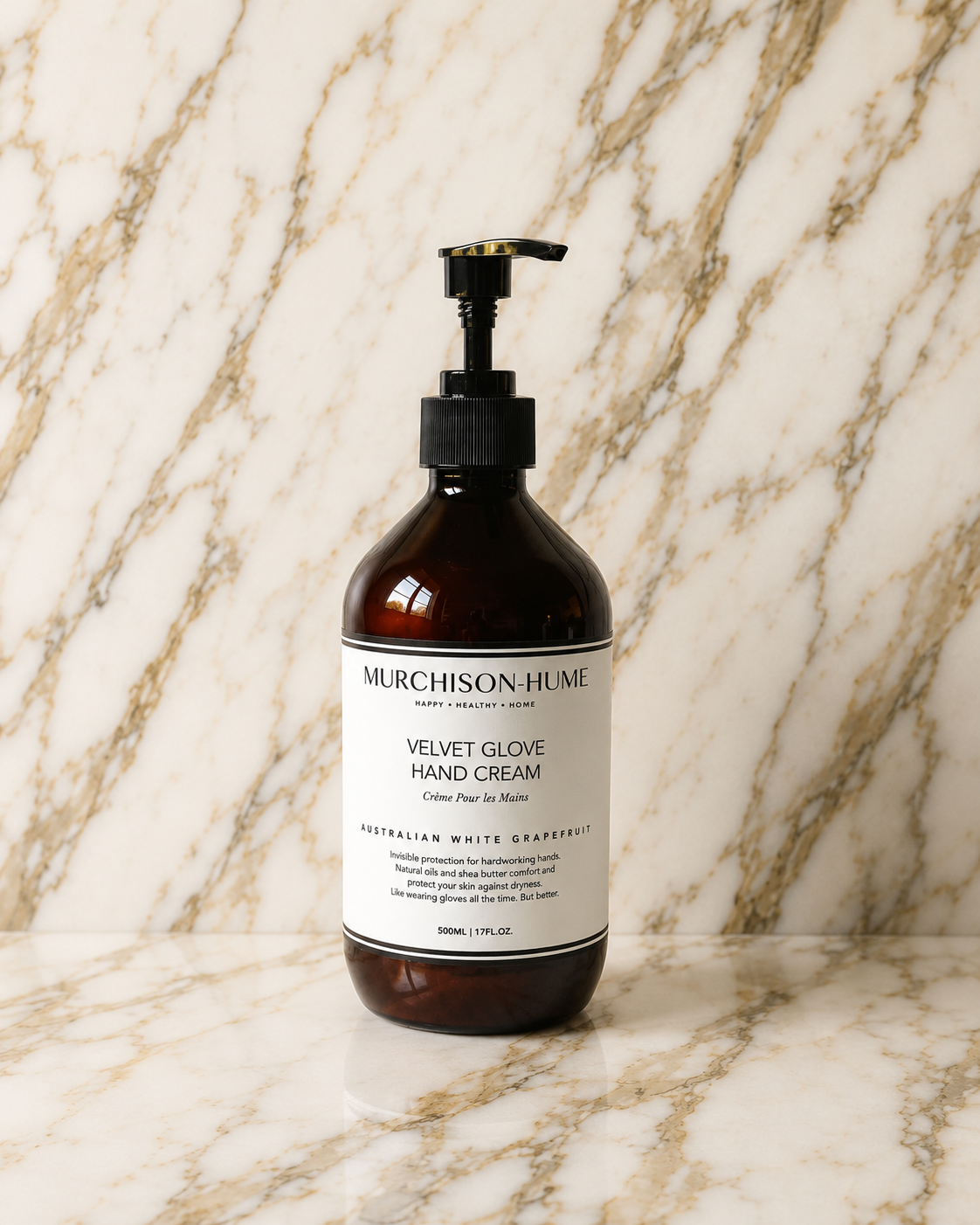 Murchison Hume hand cream bottle on a marble background